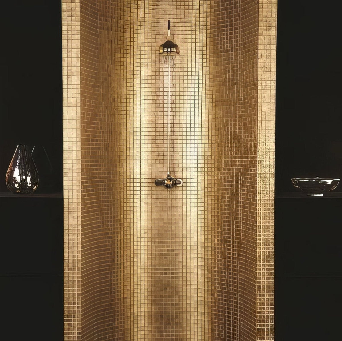 A sleek modern showerhead with polished brass finish and integrated rain-style spray head for luxurious bathroom decor