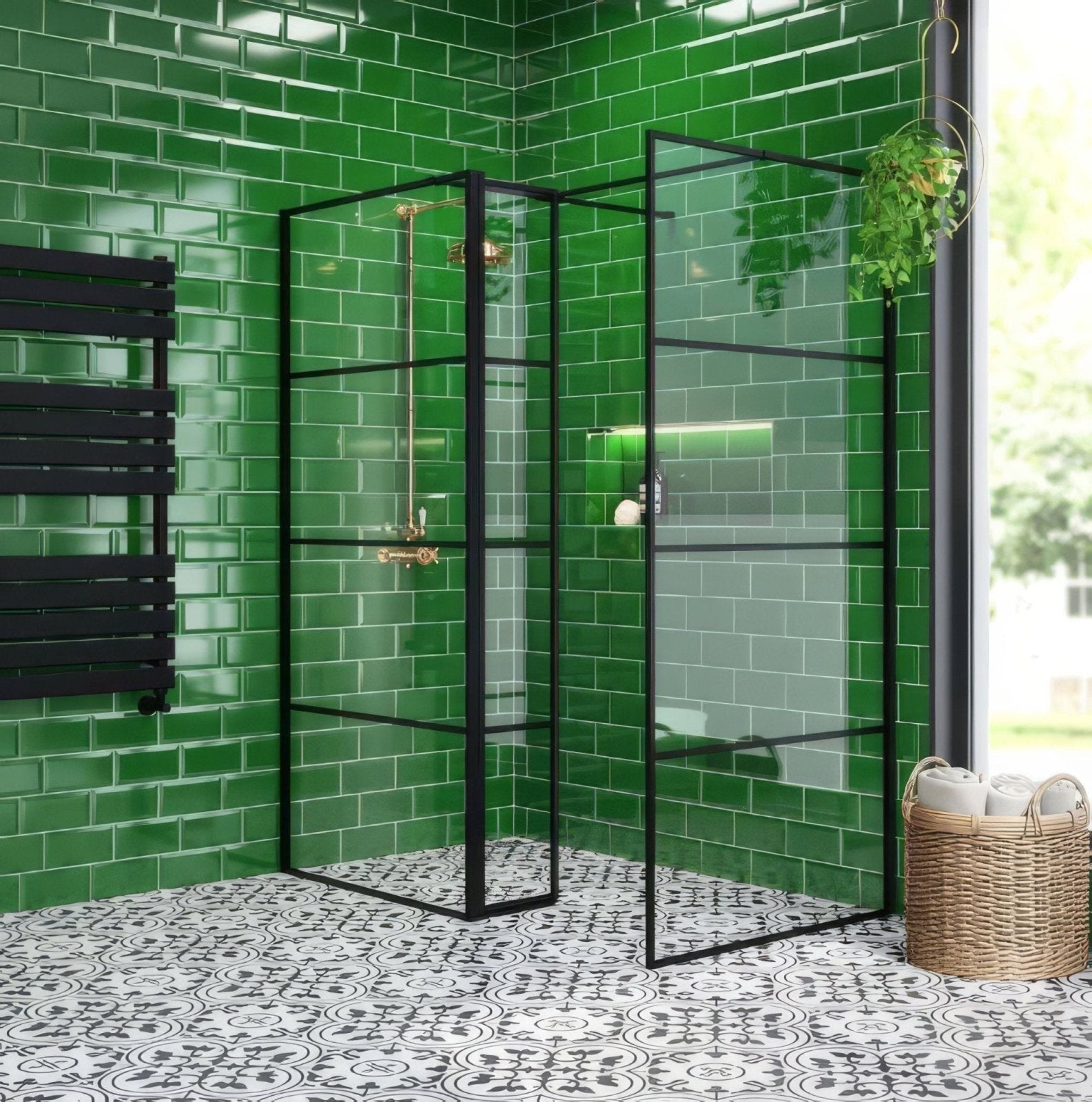 Black-framed glass shower enclosure with gold-toned fixtures against vibrant green matt tiled walls for shower use