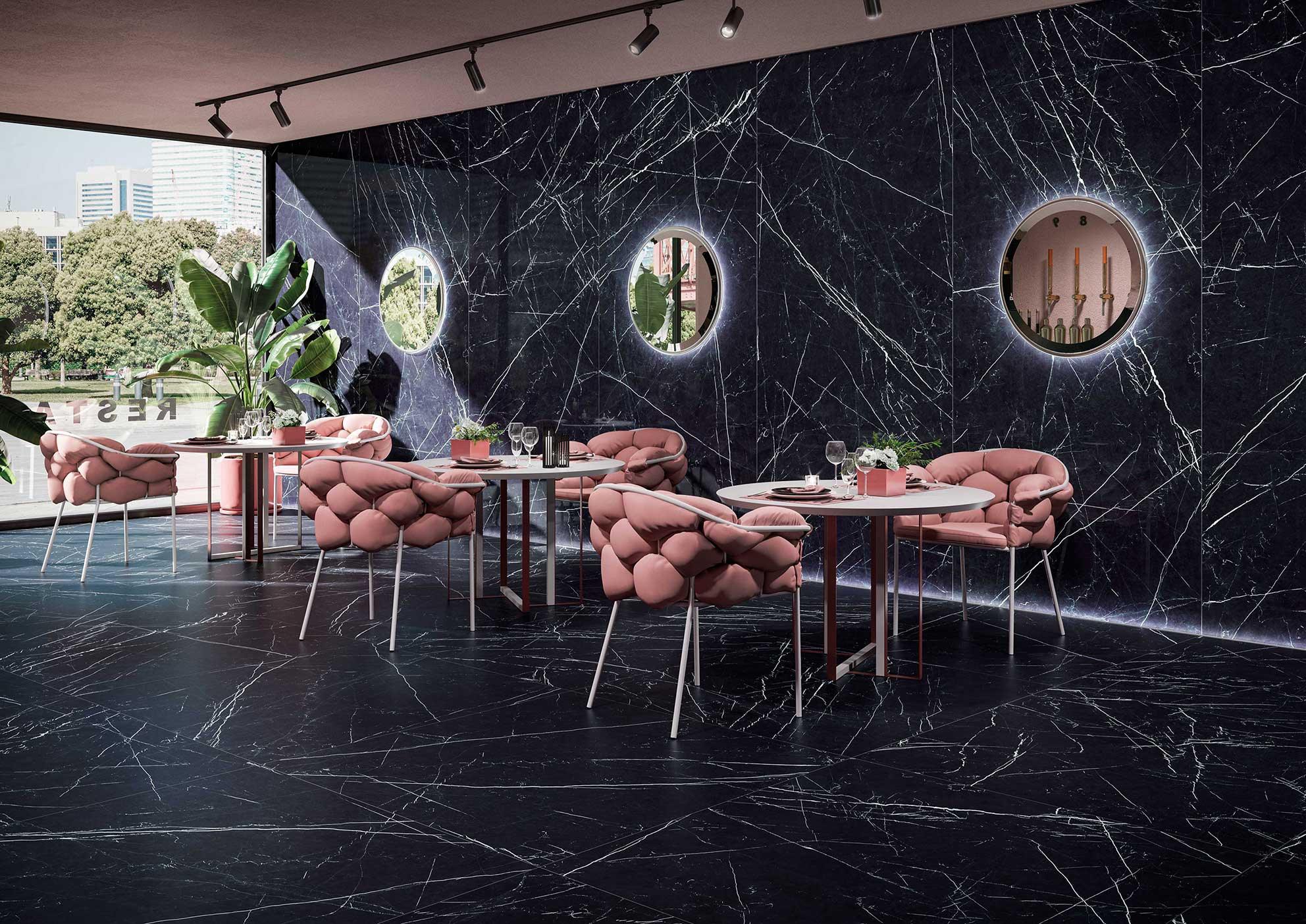 Pink tufted velvet chairs with slender metal legs complement modern wall panels for luxury interior updates