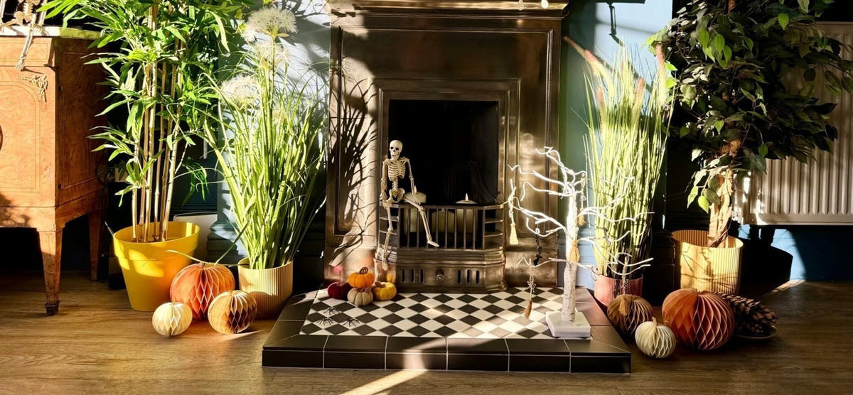 'New fireplace hearth tiles have transformed my living room into a snug' - Hyperion Tiles