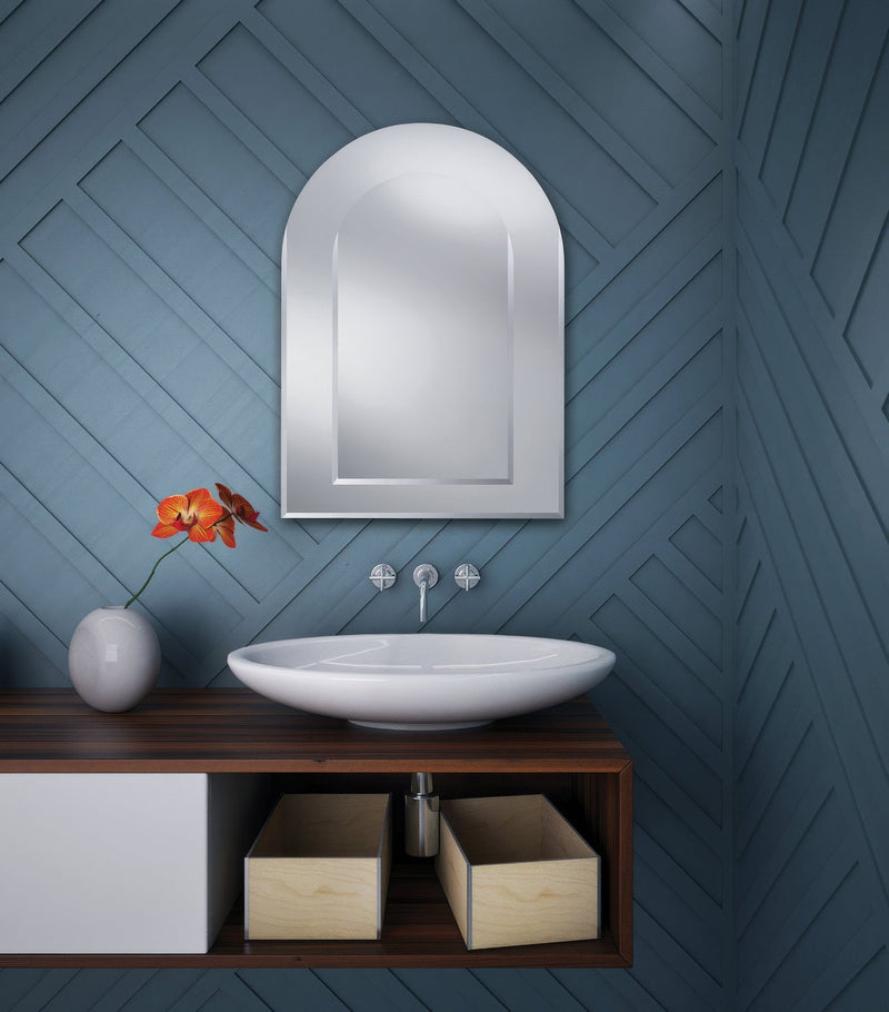 White oval sink with sleek modern design mounted on dark wood vanity from the arch mirrors collection