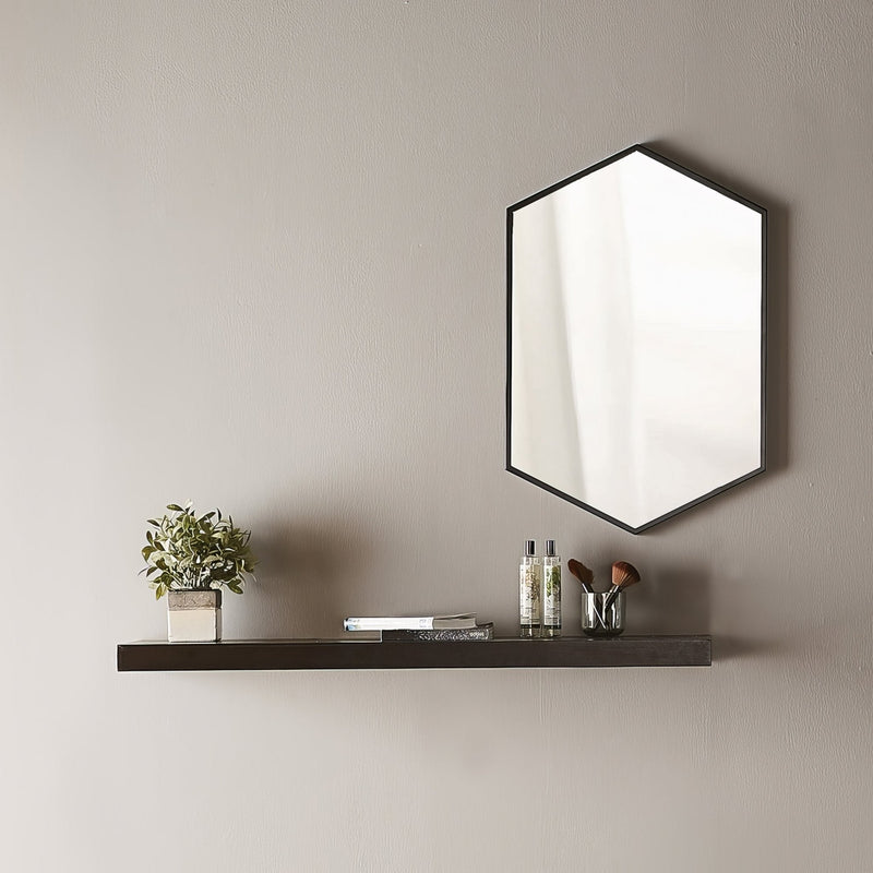Hexagonal mirror with a sleek black frame made of metal featured in a hexagon mirrors collection