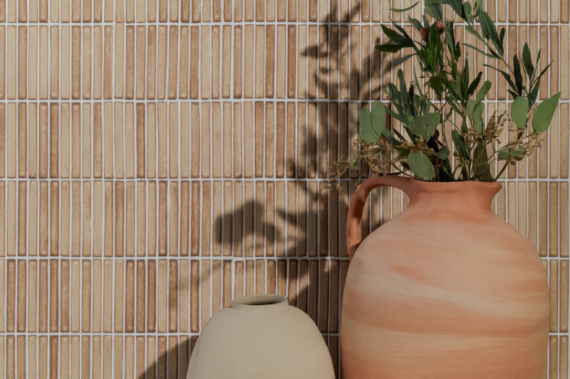 Terracotta pitcher with handle and subtle marbled texture from the Kit Kat Mosaic Tiles collection