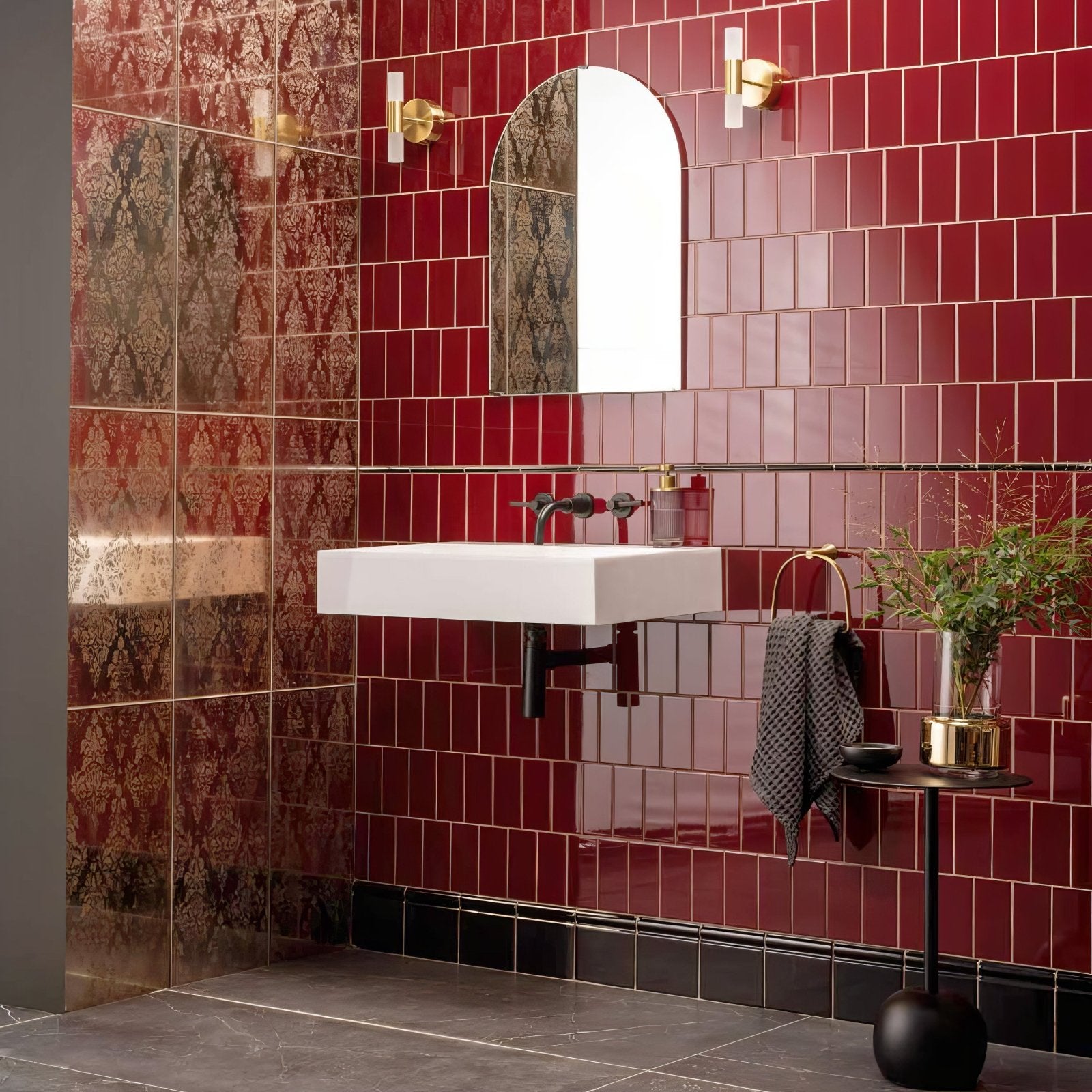 White rectangular wall-mounted sink with black faucet and chrome fixtures in red tiles collection bathroom setting