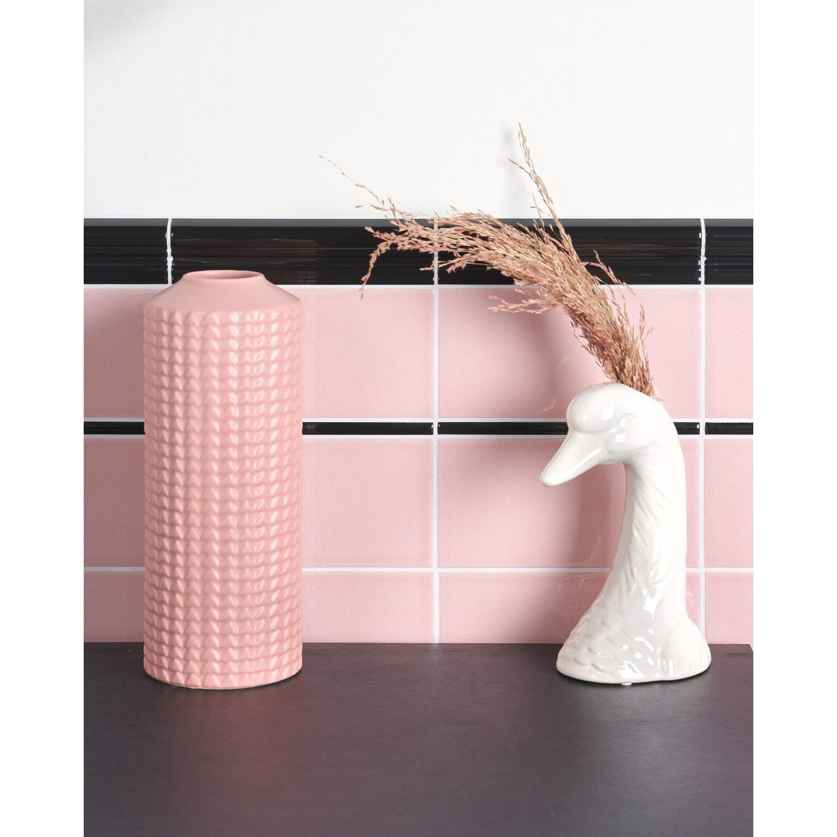 Ca'Pietra Architectural Ceramic Pencil Moulding in glossy black, 20 x 1 x 1cm, edging a tiled wall