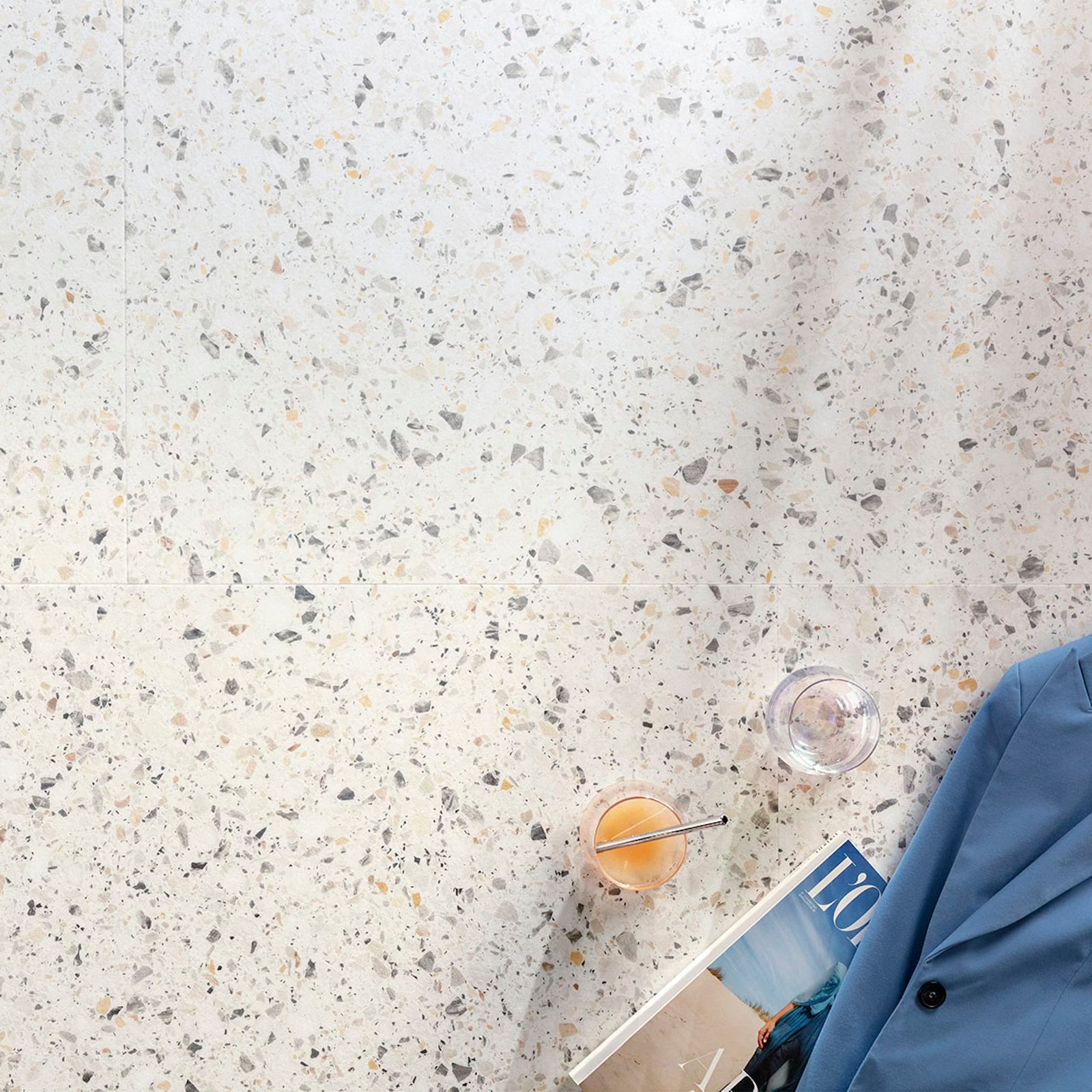 Verona F023 terrazzo big vinyl tiles with speckled terrazzo floor in light neutral base with gray beige earth tones