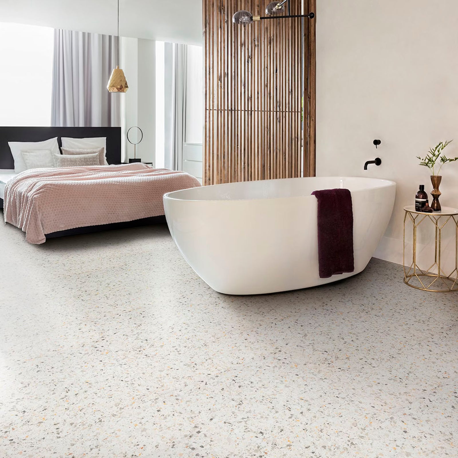 Modern freestanding bathtub in white with a sleek minimalist design on verona f023 terrazzo big vinyl tiles