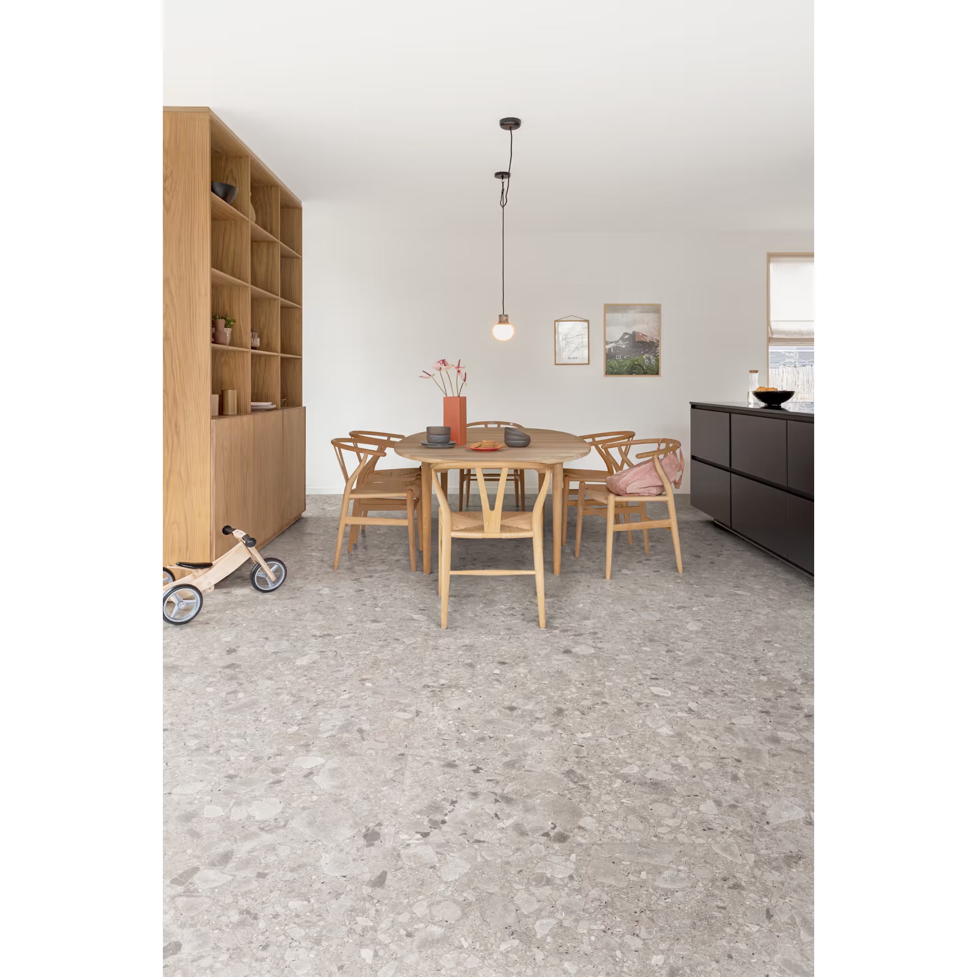 Modern kitchen with wooden furniture and gray flooring