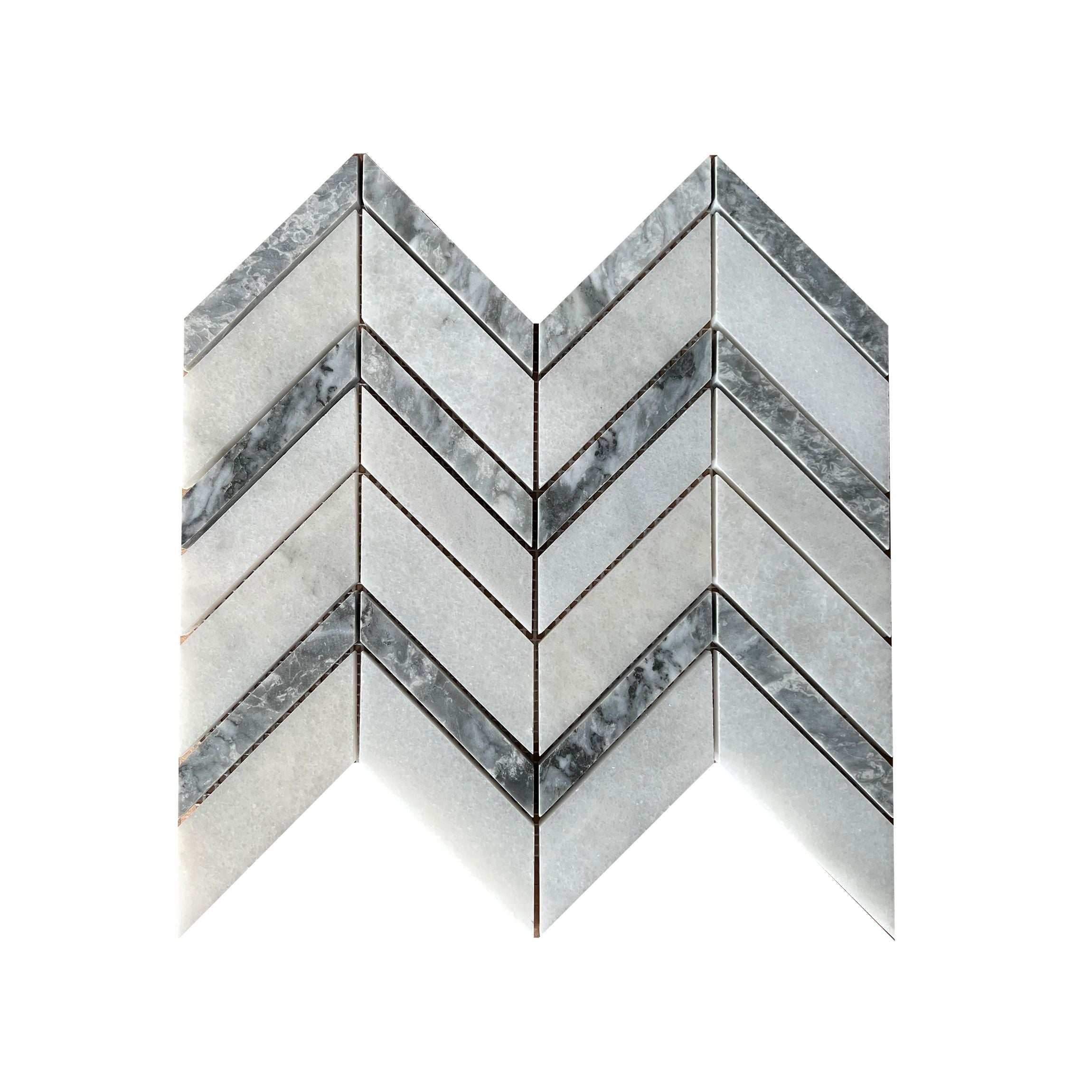 Sheet of Carrara White honed marble chevron mosaic showing mitred batons meeting point to point