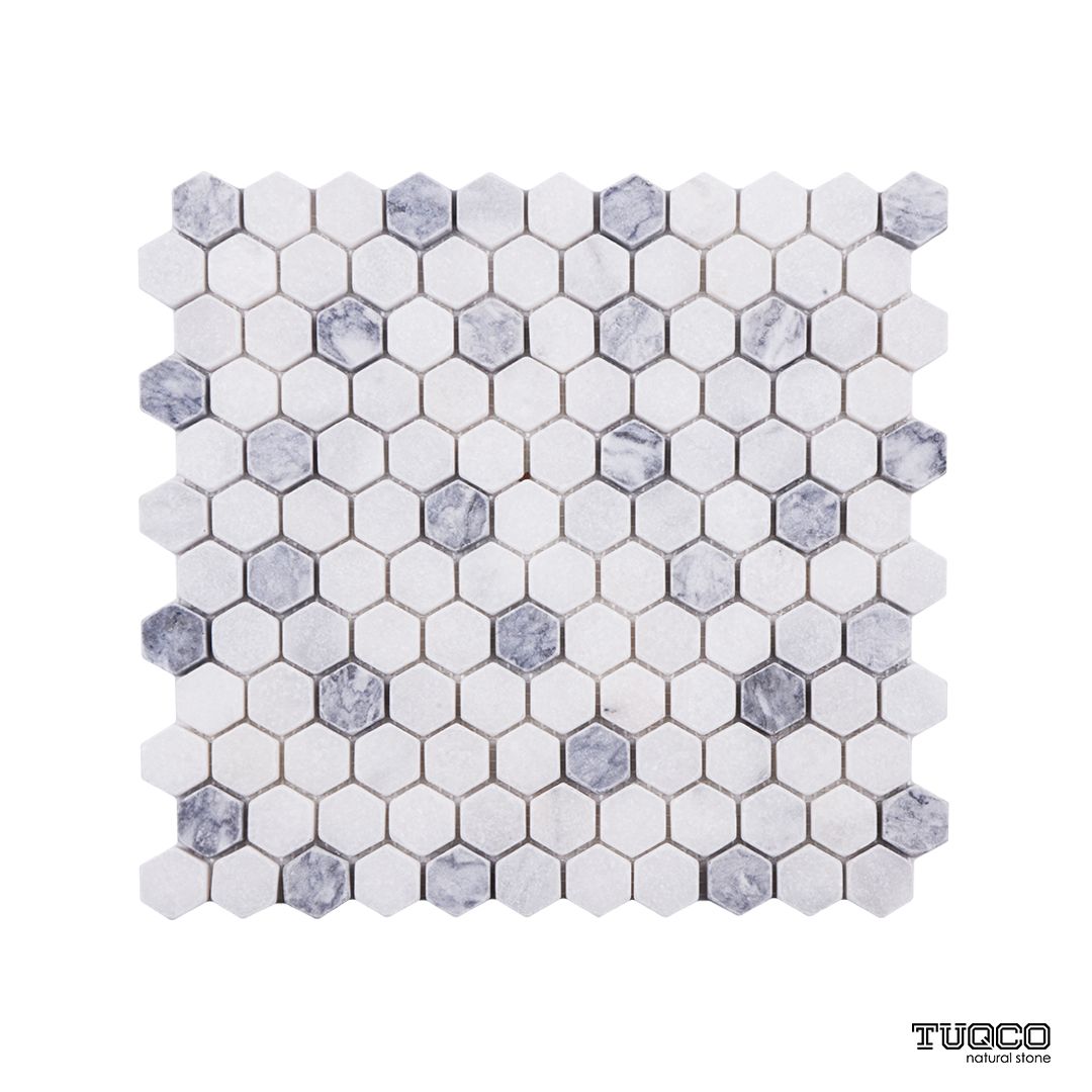 Carrara white and Platinum Grey tumbled marble hexagon mosaic sheet showing the two-tone mix