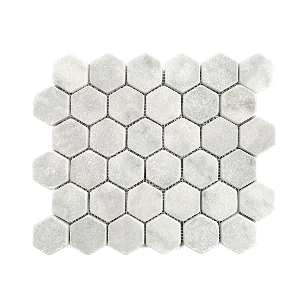 Full sheet of Carrara white tumbled marble 48mm hexagon mosaic laid flat