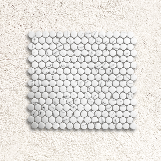 White marble mosaic tile with round glossy pieces in a grid pattern from Ritz Statuario round mosaic collection