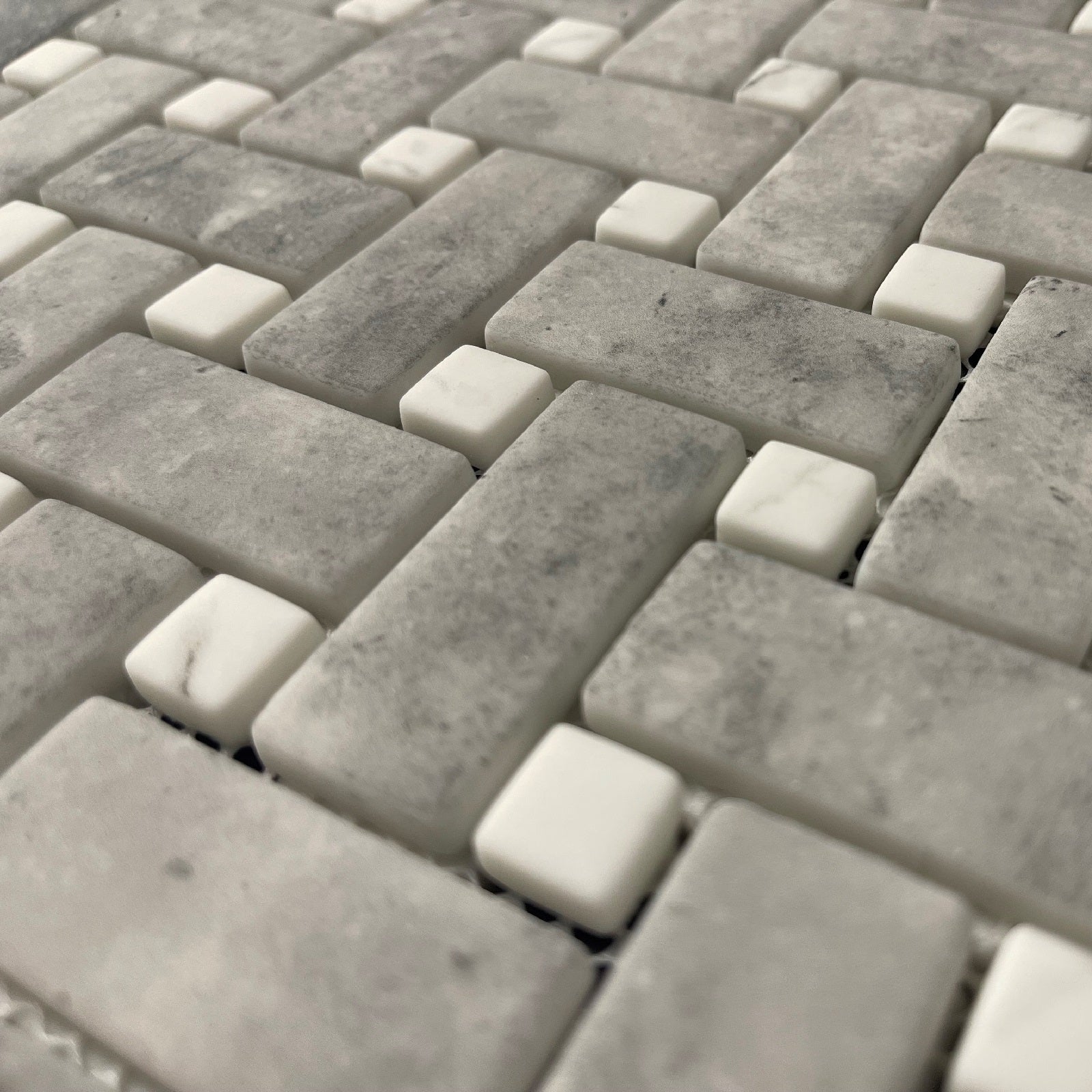 Ritz Grey Marble Carrara basketweave mosaic tile with gray and white marble in a woven pattern