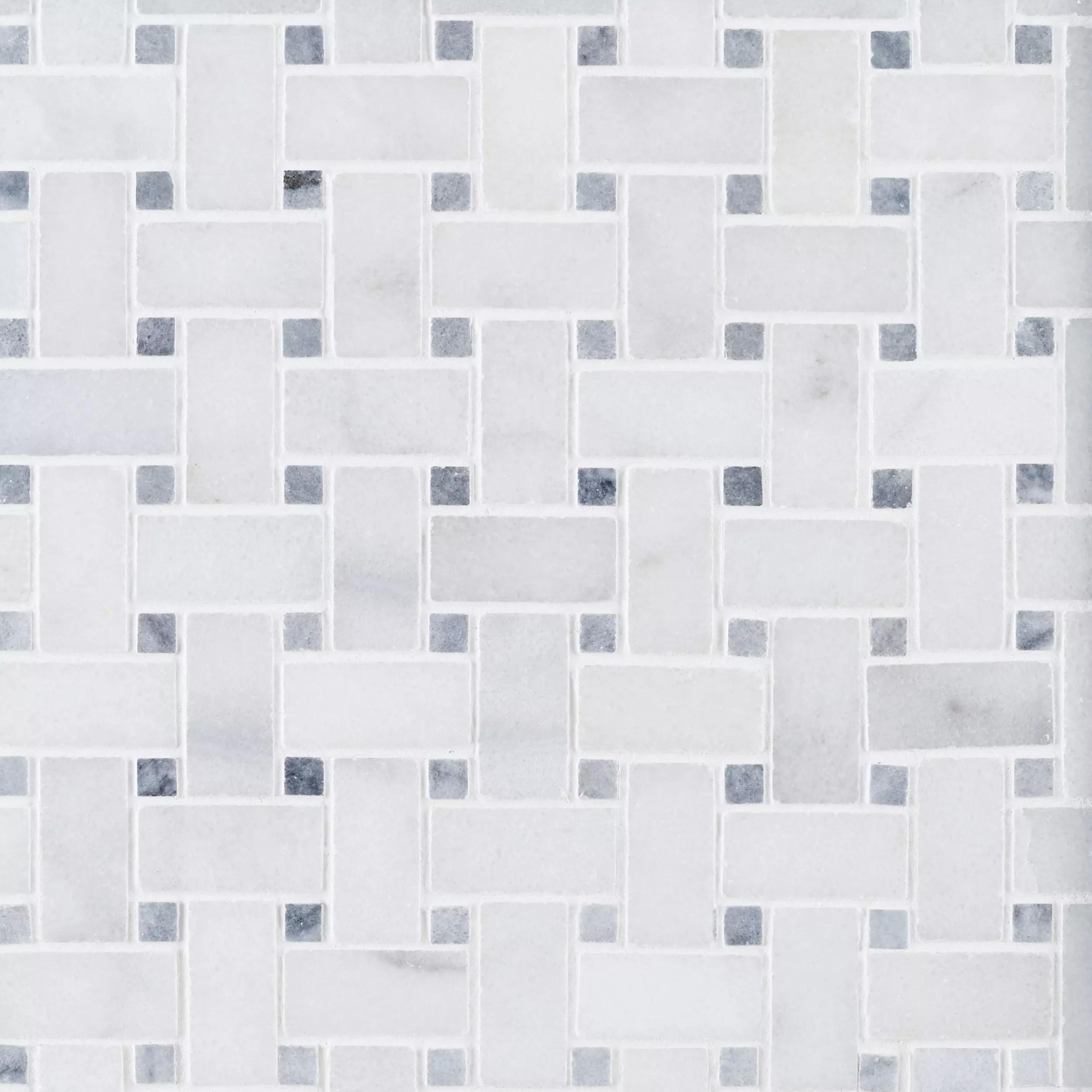 Close detail of fine Carrara veining and platinum grey centre squares in the polished basket weave