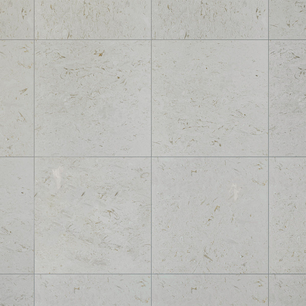 Brushed Shellstone limestone used on a bathroom wall beside pale joinery