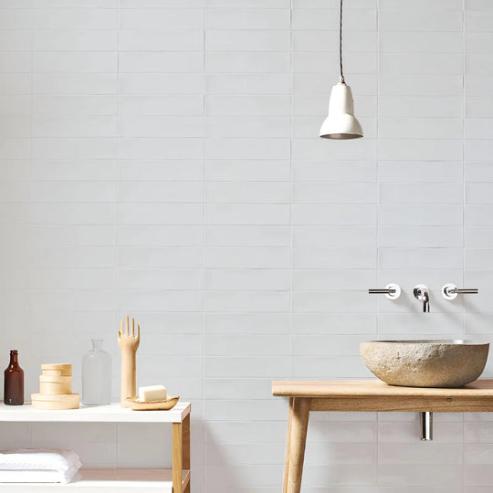 Belgravia Snow Gloss 7.5 x 30cm white ceramic metro tiles in a room setting