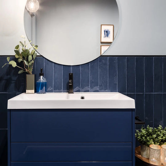 Belgravia Ocean Gloss 7.5 x 30cm deep blue ceramic metro tiles in a room setting