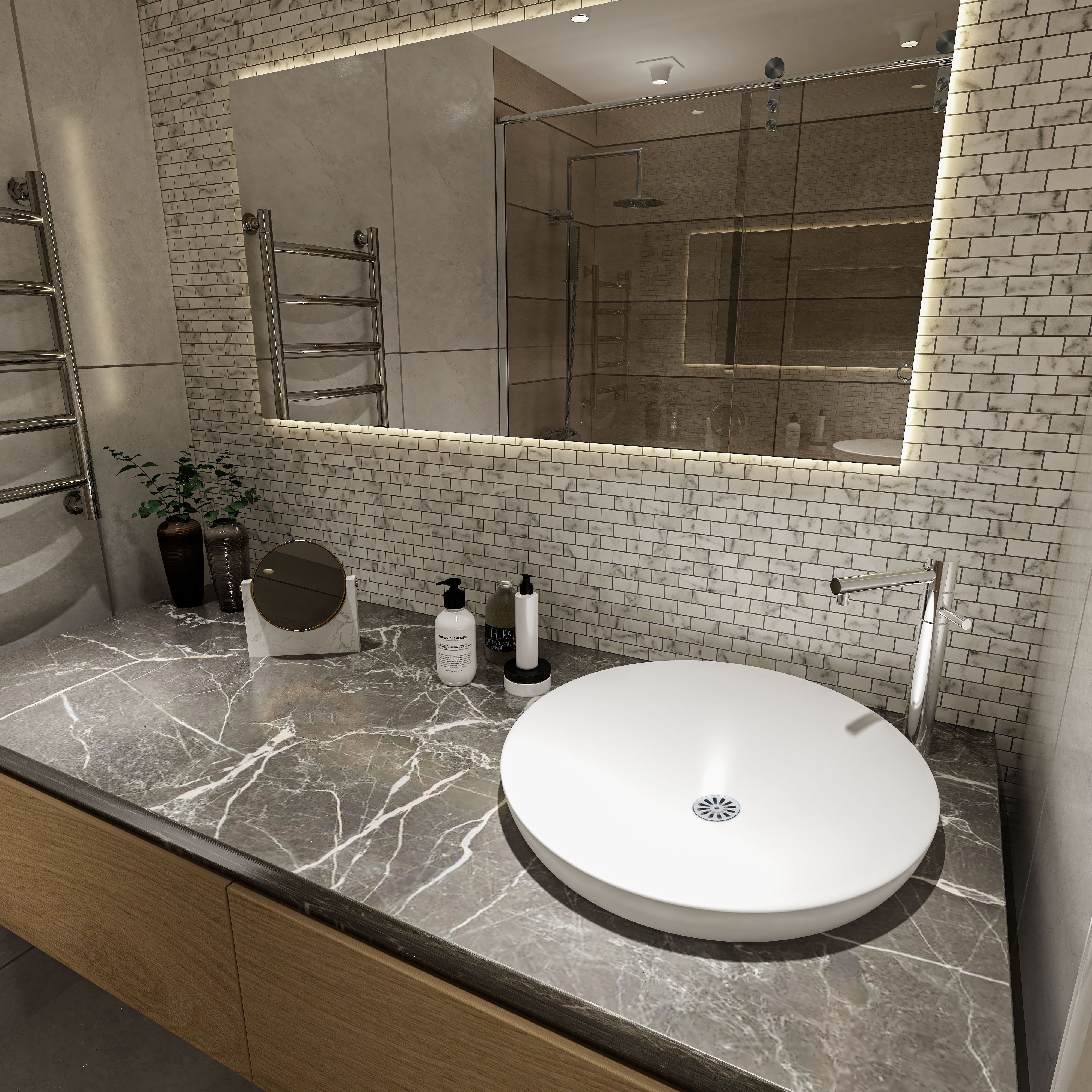 White marble brick mosaic used as a splashback in a finished interior