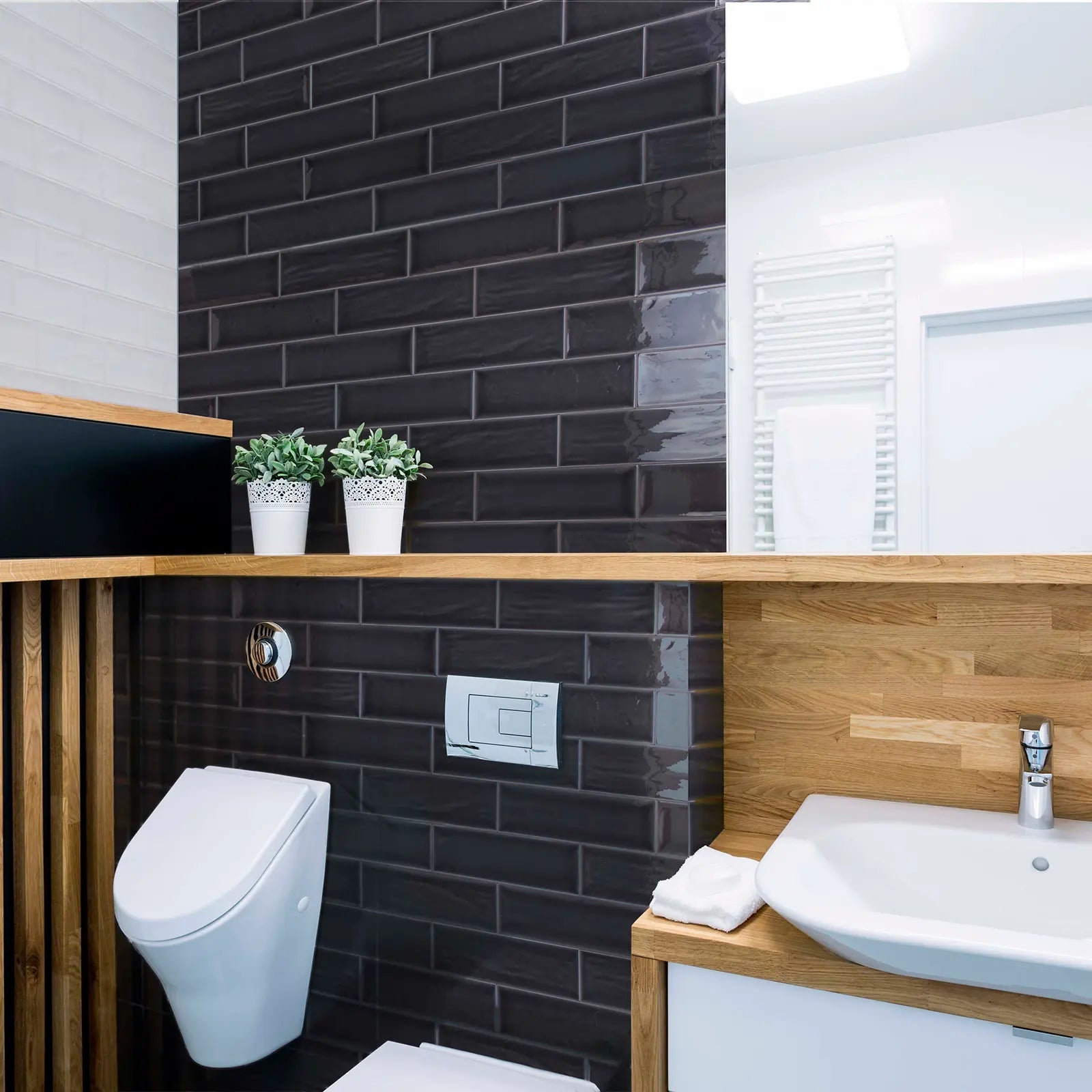Aria Black Gloss 10 x 30cm glazed ceramic metro tile room setting