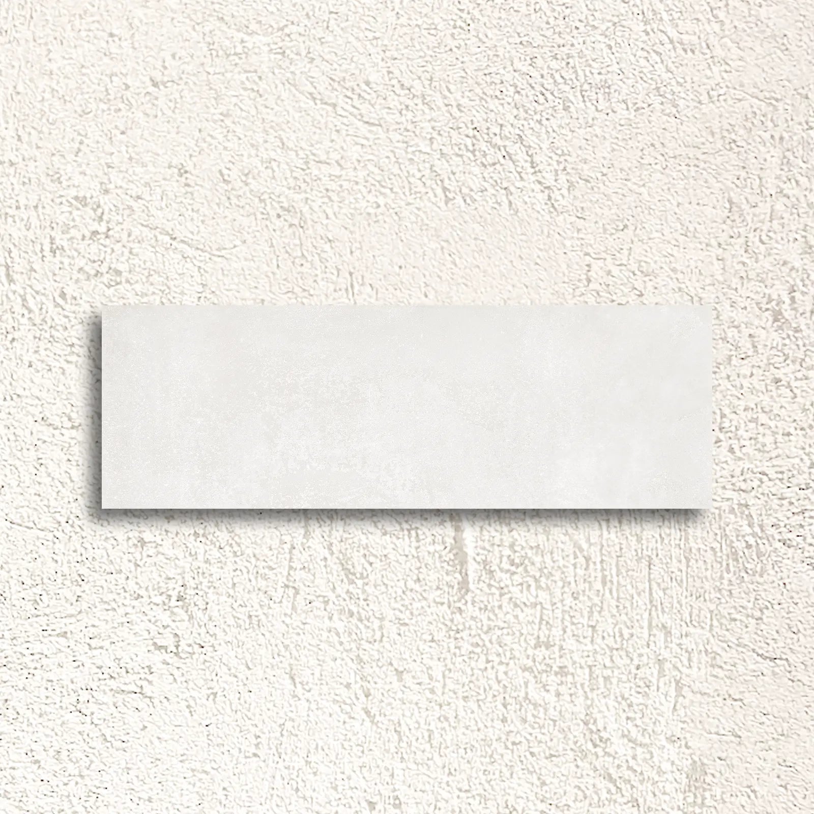 Neutra White 30 x 90cm glazed ceramic concrete-effect wall tile face