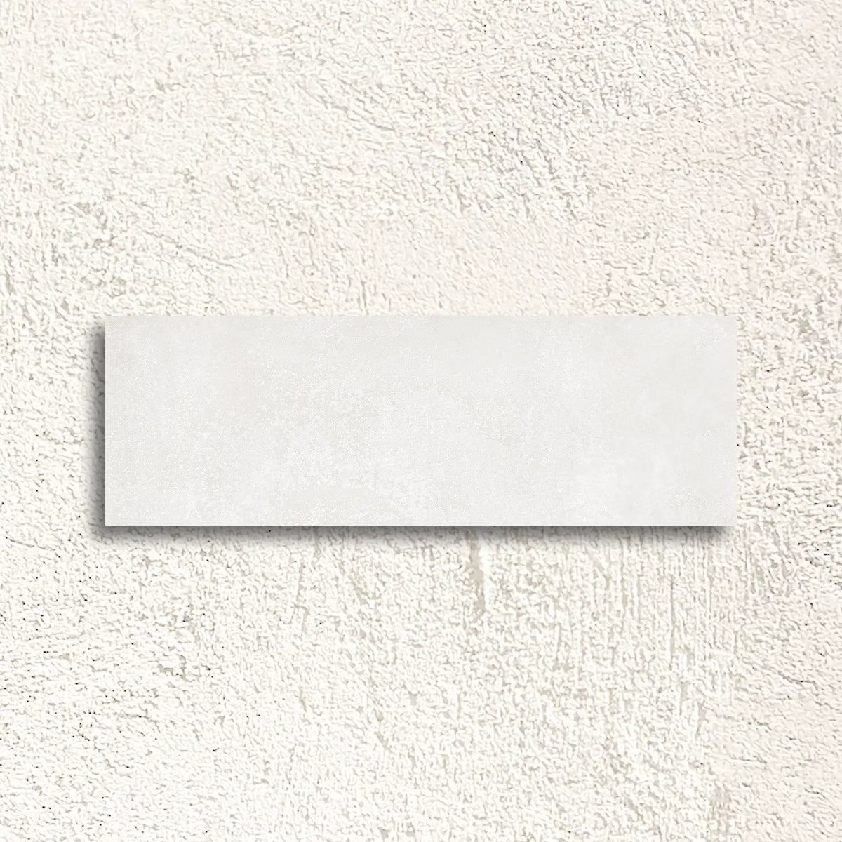 Neutra White 30 x 90cm glazed ceramic concrete-effect wall tile face