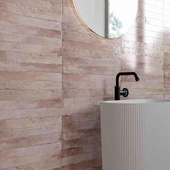 Genesi Pink Brillo 4.8 x 45cm pink gloss brick tiles in a room setting