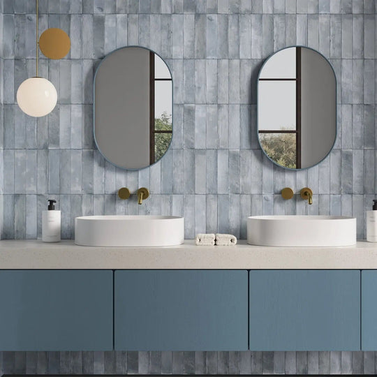 Terra Blue 6 x 24.6cm porcelain zellige-look tiles in a styled room setting