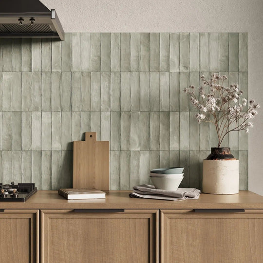 Terra Green 6 x 24.6cm porcelain zellige-look tiles in a styled room setting