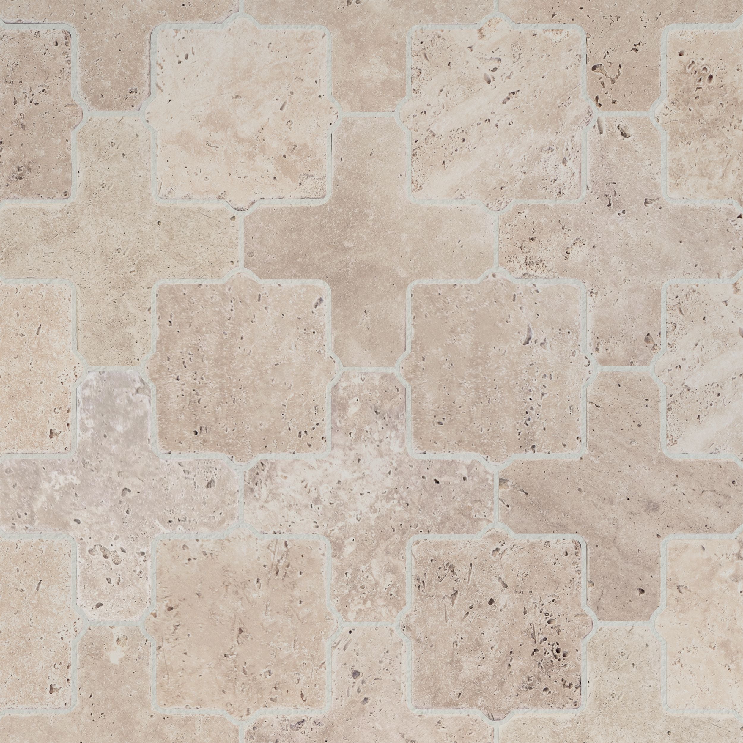 Close detail of the interlocking Casablanca shapes and softened tumbled edges in travertine