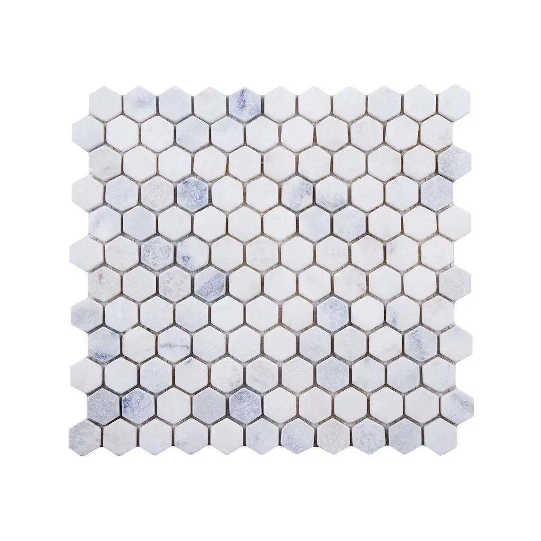 Carrara white tumbled marble hexagon mosaic sheet with soft grey veining on a cool white ground