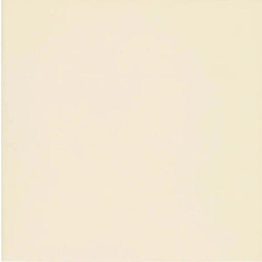 Solid cream-colored surface of abbey ivory tile showcasing smooth ceramic finish for interior wall applications
