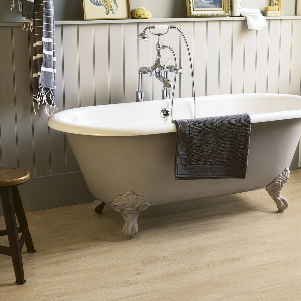 Roomset showing Cotswold Sycamore pale wood effect plank tiles in a styled interior