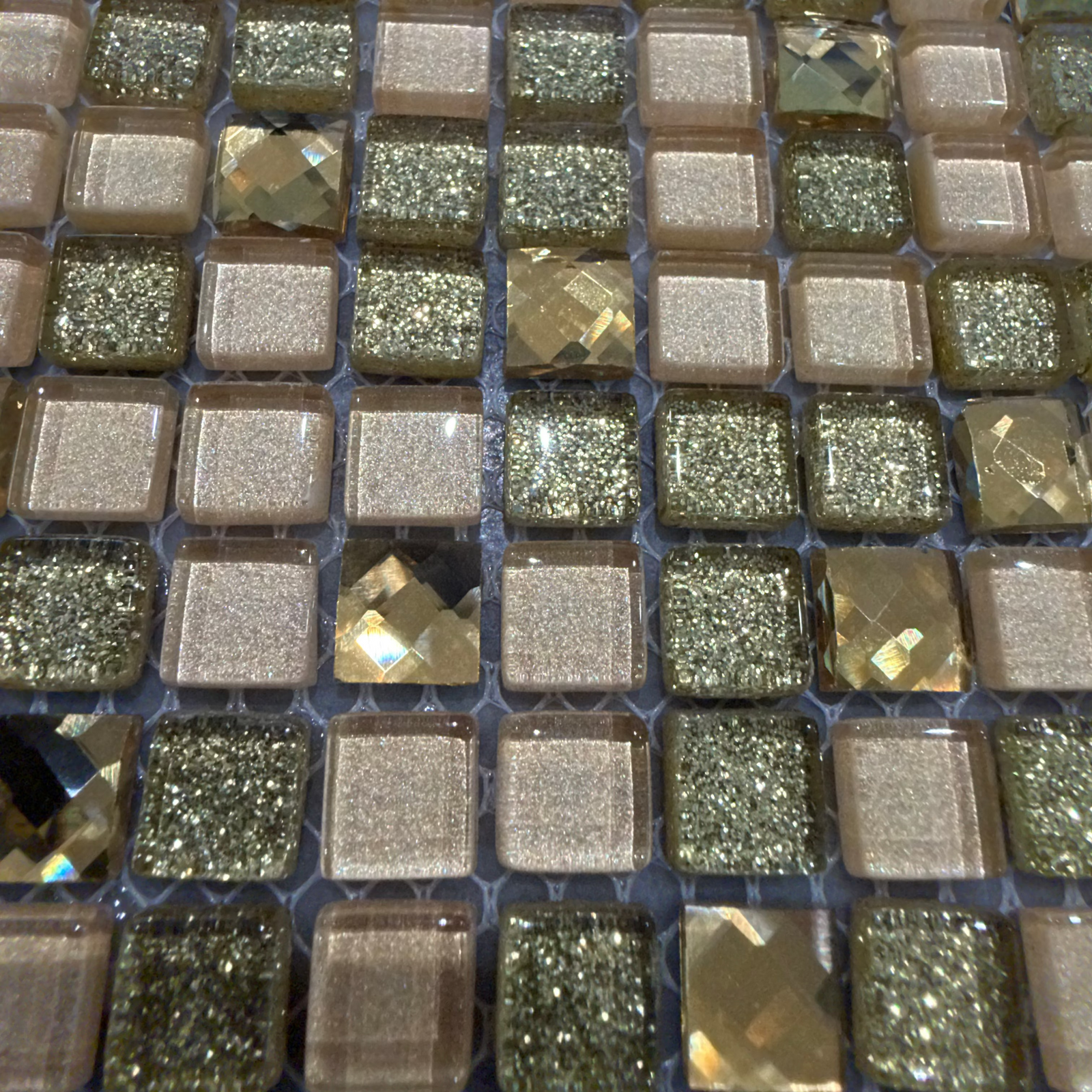 Svarna sparkling mosaic gold and champagne tiles with glittery faceted surfaces for decorative wall use