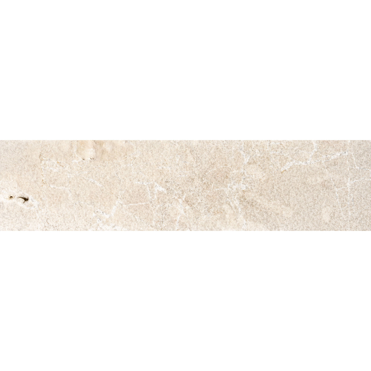 Beige marble tile with subtle veining and natural stone texture from enki limestone parquet velvet finish collection