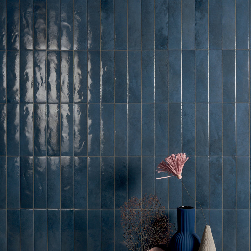 Sensa Mini Blu Polished 6 x 24cm Wall Tile in a room setting