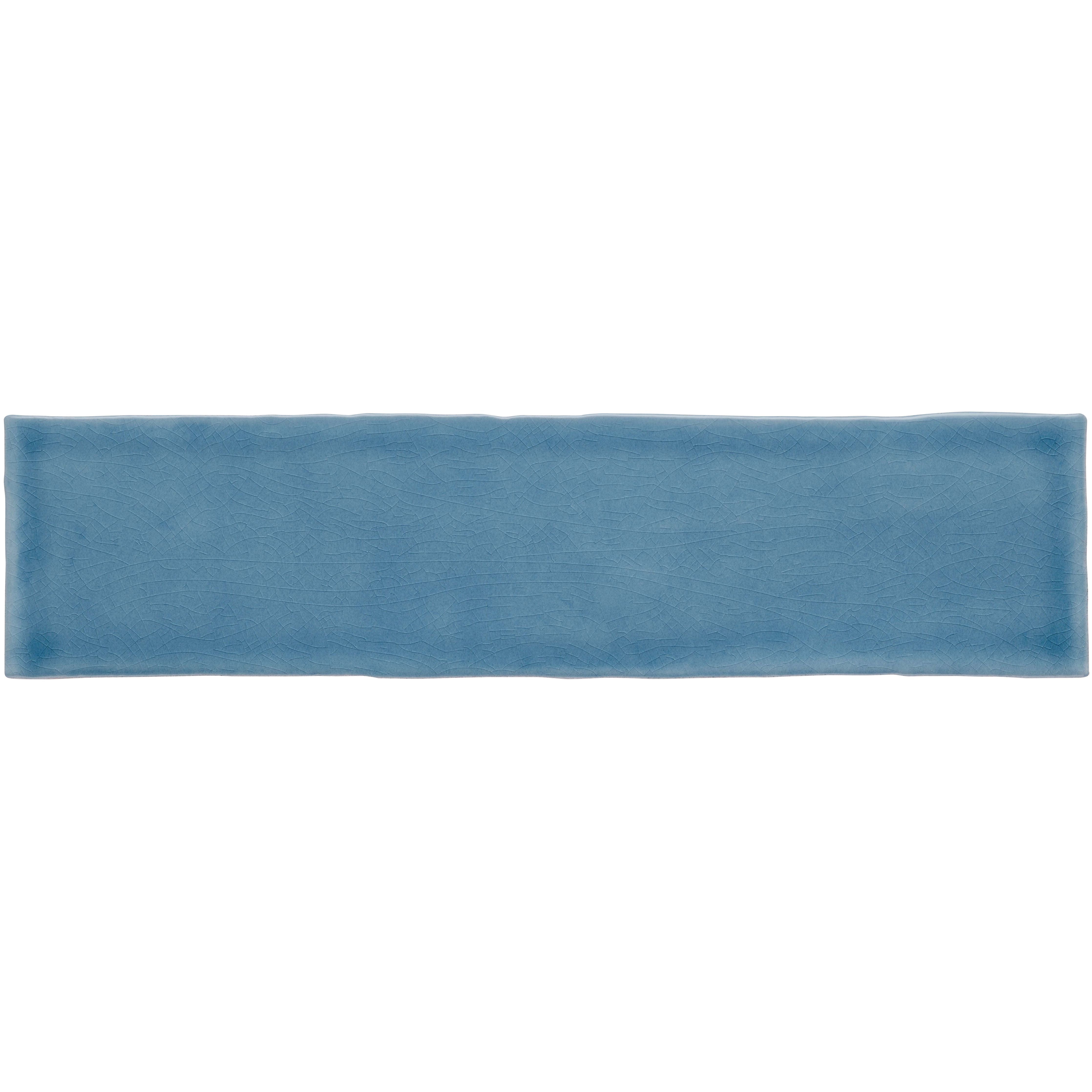 A rectangular blue ceramic large brick tile with a subtle textured surface in teal color