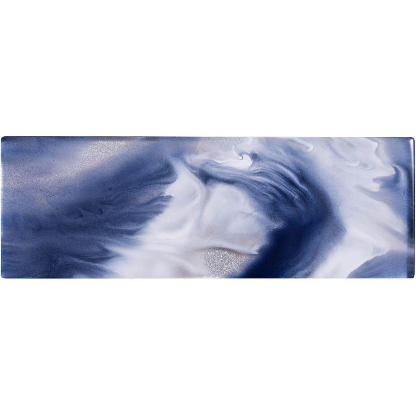 A rectangular ceramic ocean patterned brick tile with deep blue white swirling pattern and subtle metallic flecks