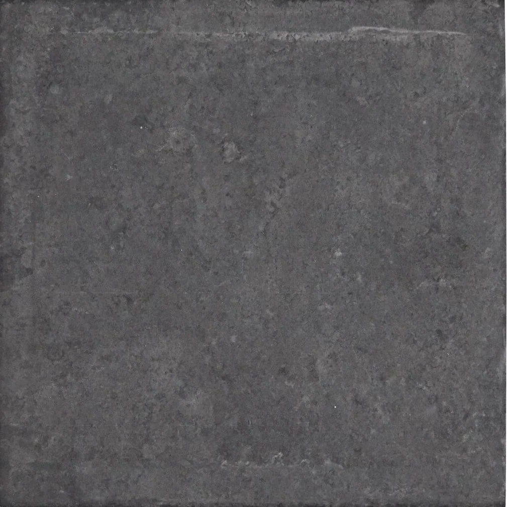 Urban charcoal plain porcelain tile in dark gray with a rough textured surface and subtle tonal variations