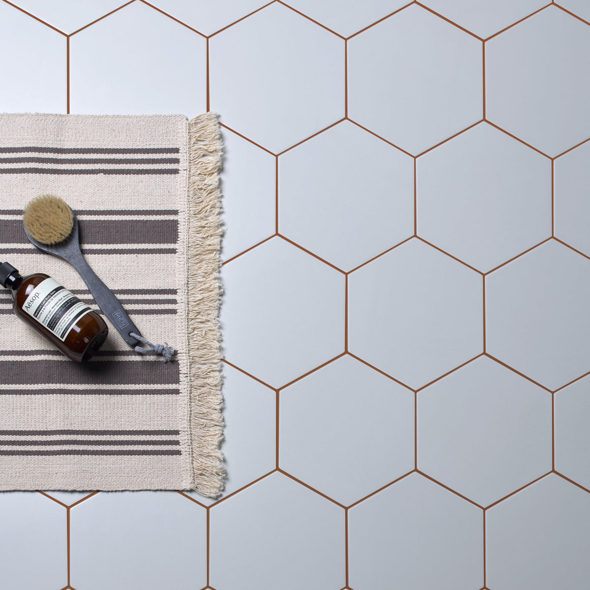 Ca'Pietra Resin-Cement Grout in Russet, shade No.41, a matt Kerakoll Fugabella grout for interior and exterior tile joints