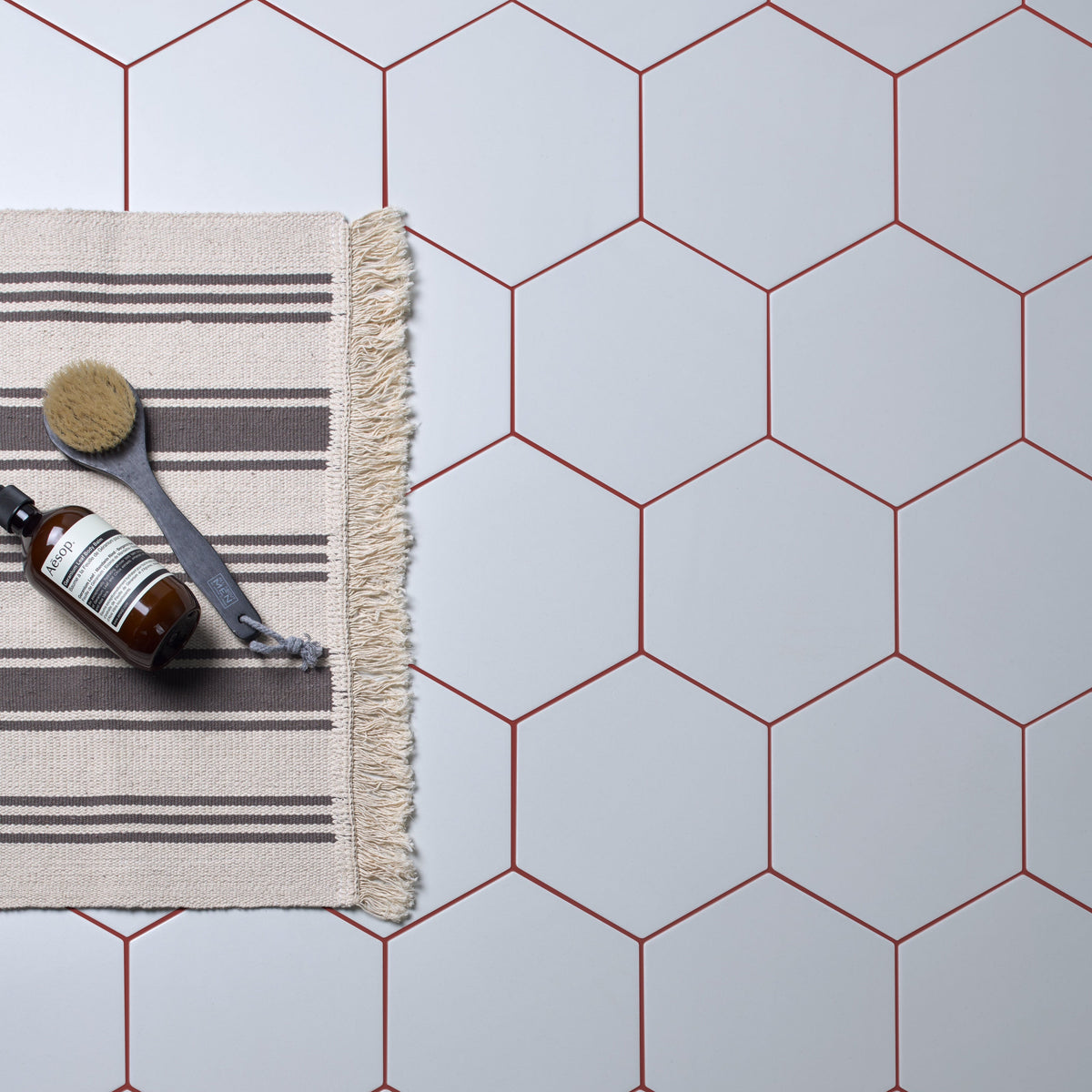 Ca'Pietra Resin-Cement Grout in Venetian Red, shade No.42, a matt venetian red coloured tile grout