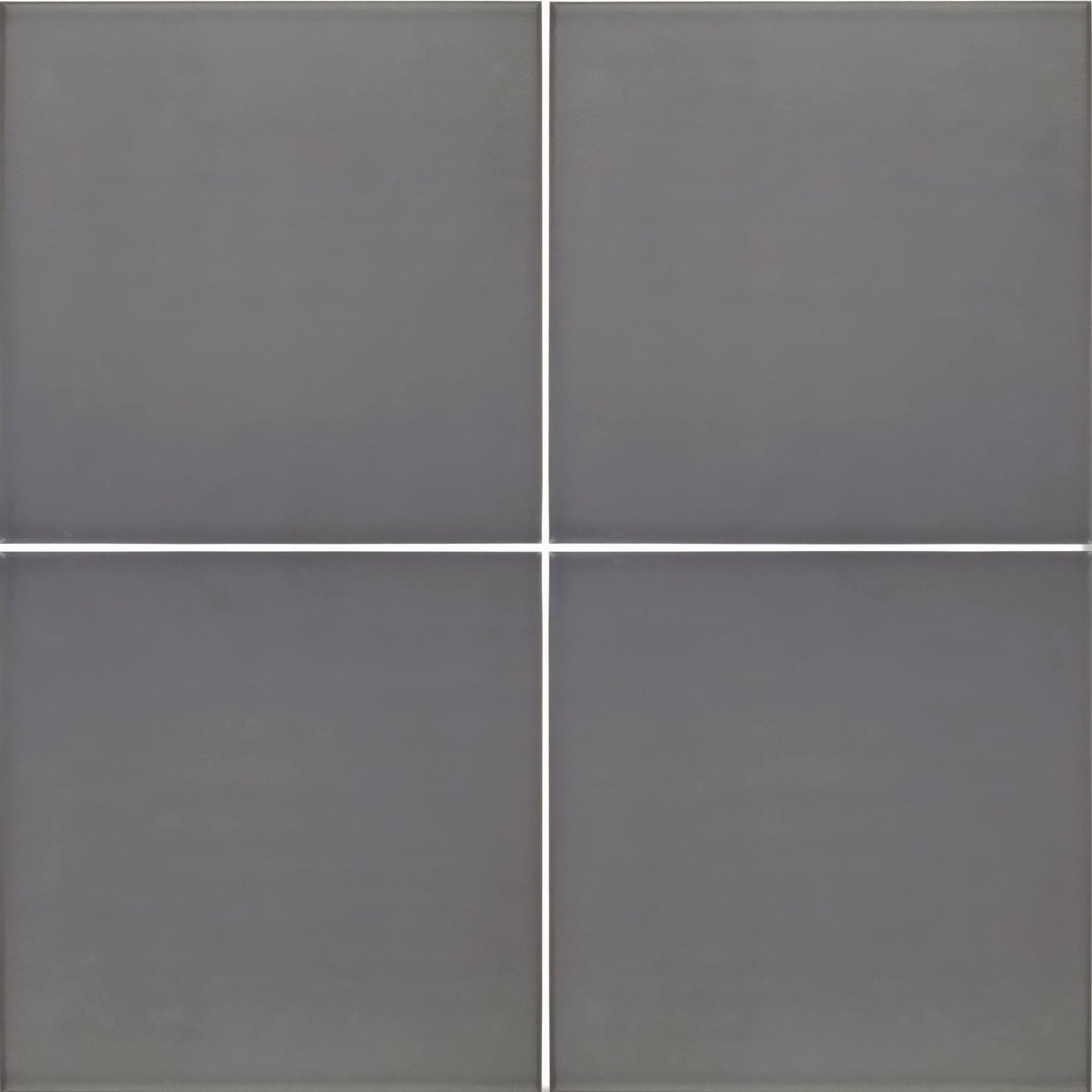Four matte gray abbey iron tiles arranged in a grid showcasing their iron material and square shape