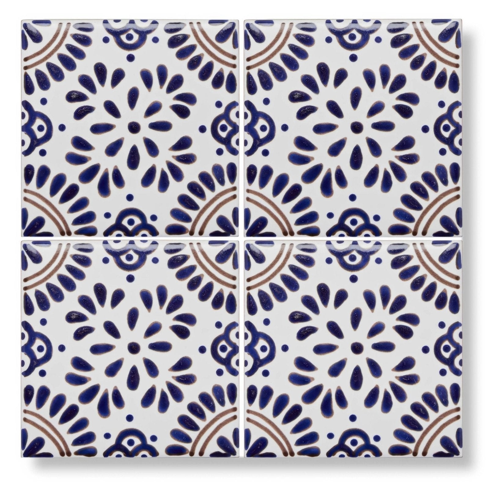 White ceramic acapulco lozano 10x10cm tile with intricate blue and brown floral patterns