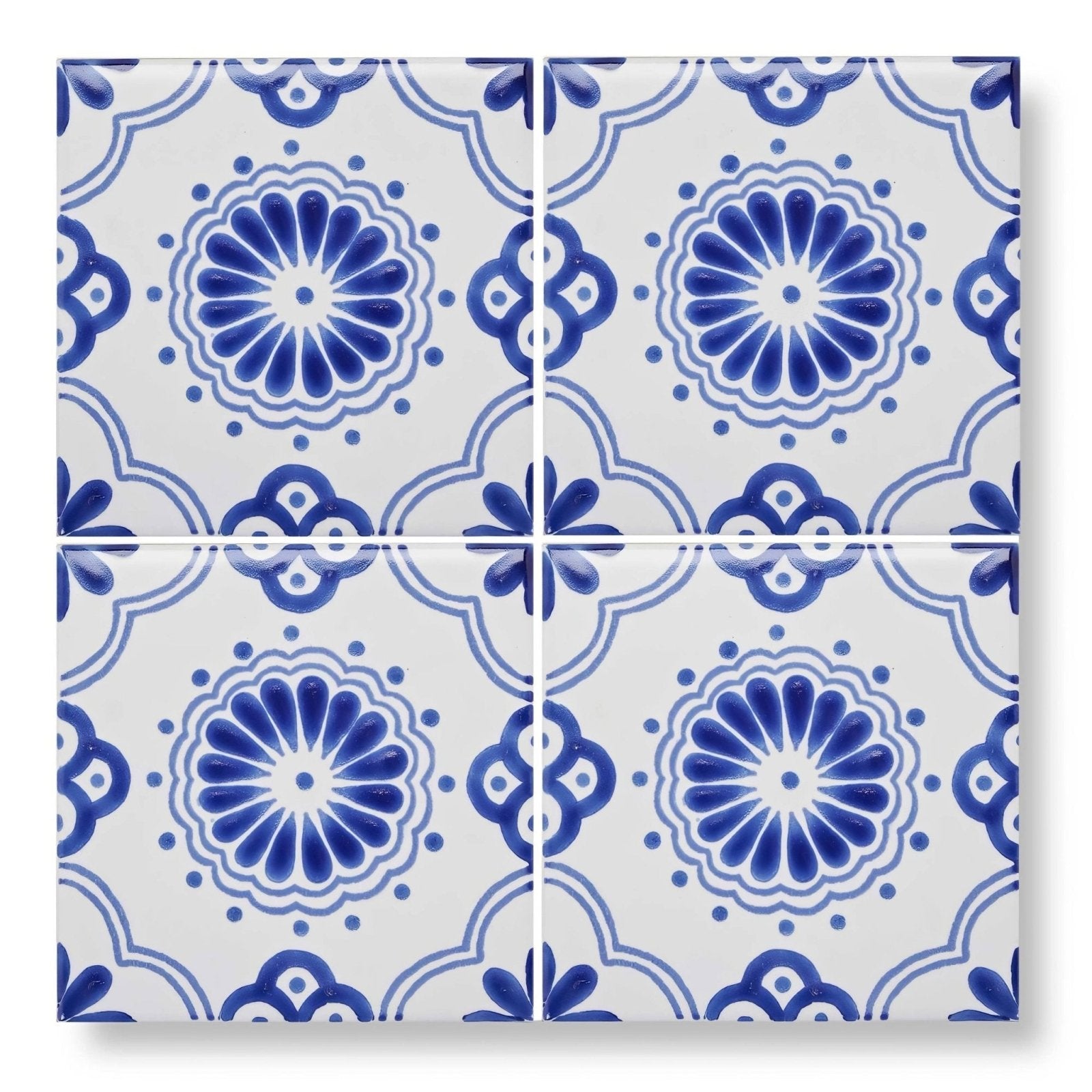 White ceramic 10x10cm acapulco salazar tile with intricate blue floral and geometric patterns