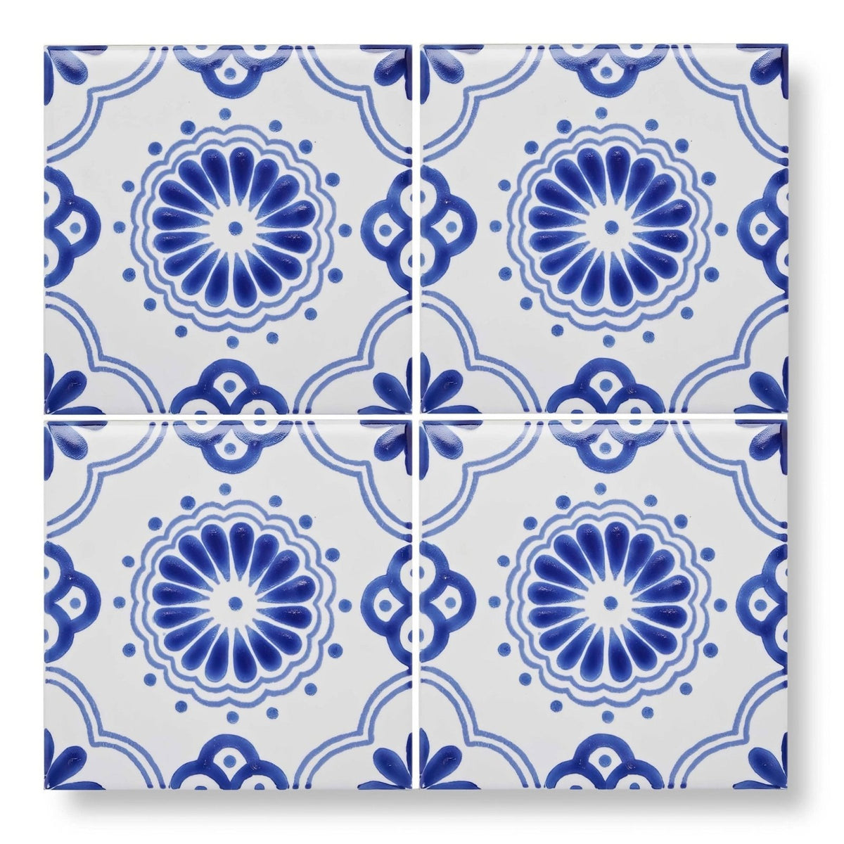 White ceramic 10x10cm acapulco salazar tile with intricate blue floral and geometric patterns
