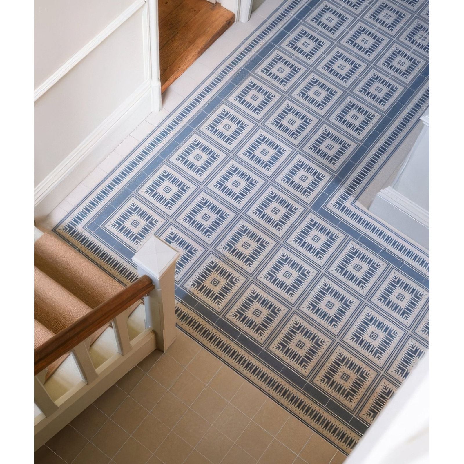 Blue and white geometric patterned porcelain floor tile with vintage-inspired design from adventuras navy field collection