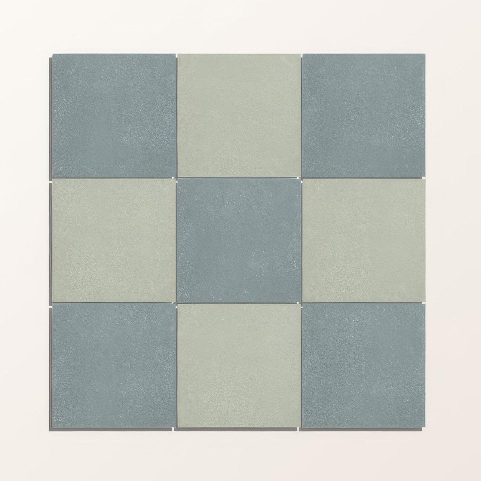 Adventuras olive field porcelain nine square tiles in a 3x3 grid with matte muted blue gray and sage green colors
