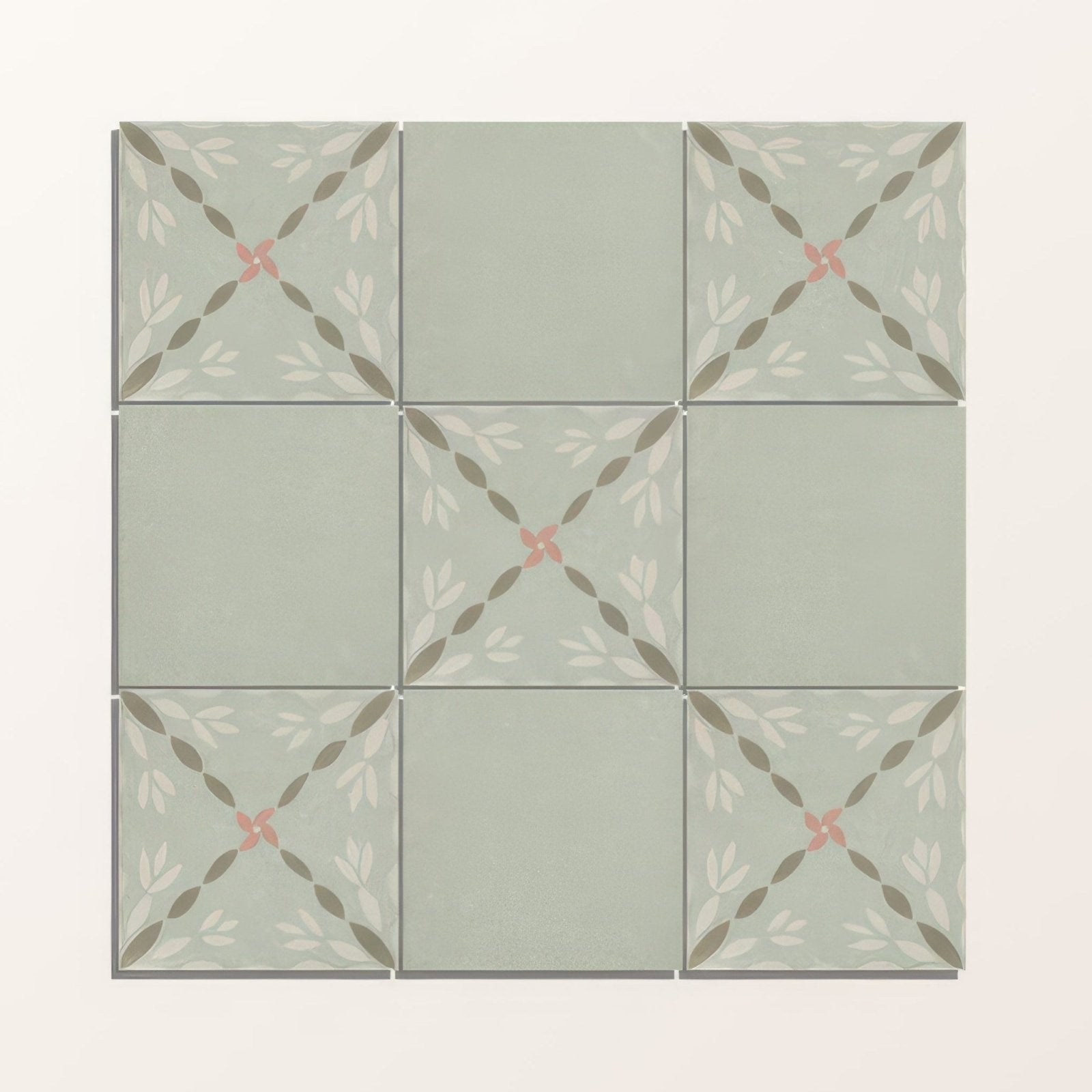 Square ceramic adventuras olive field porcelain tiles with soft sage green base and white gray leaf patterns with pink floral accents