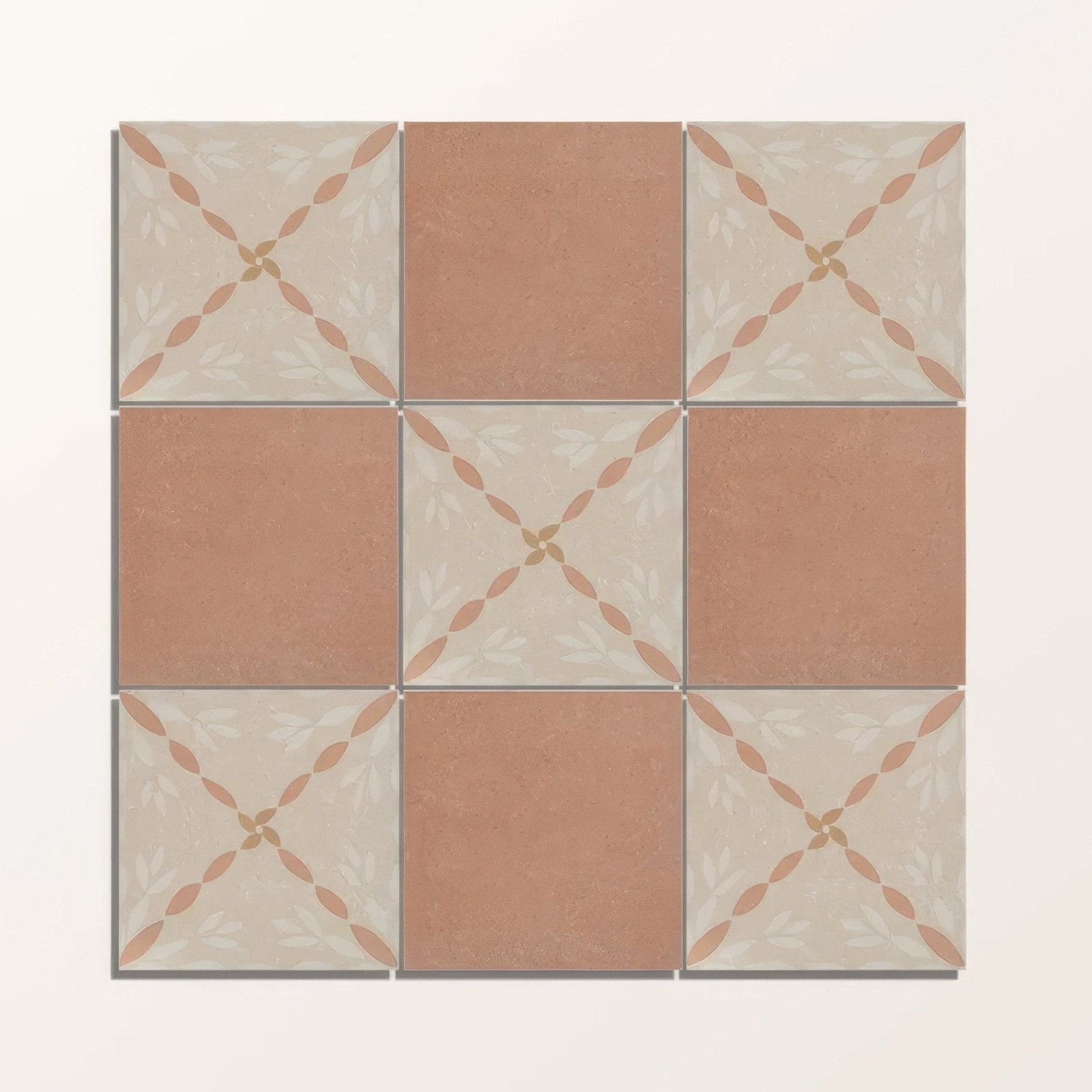 Adventuras porto terracotta porcelain tiles in terracotta and cream with subtle crosshatch pattern in muted rose tones
