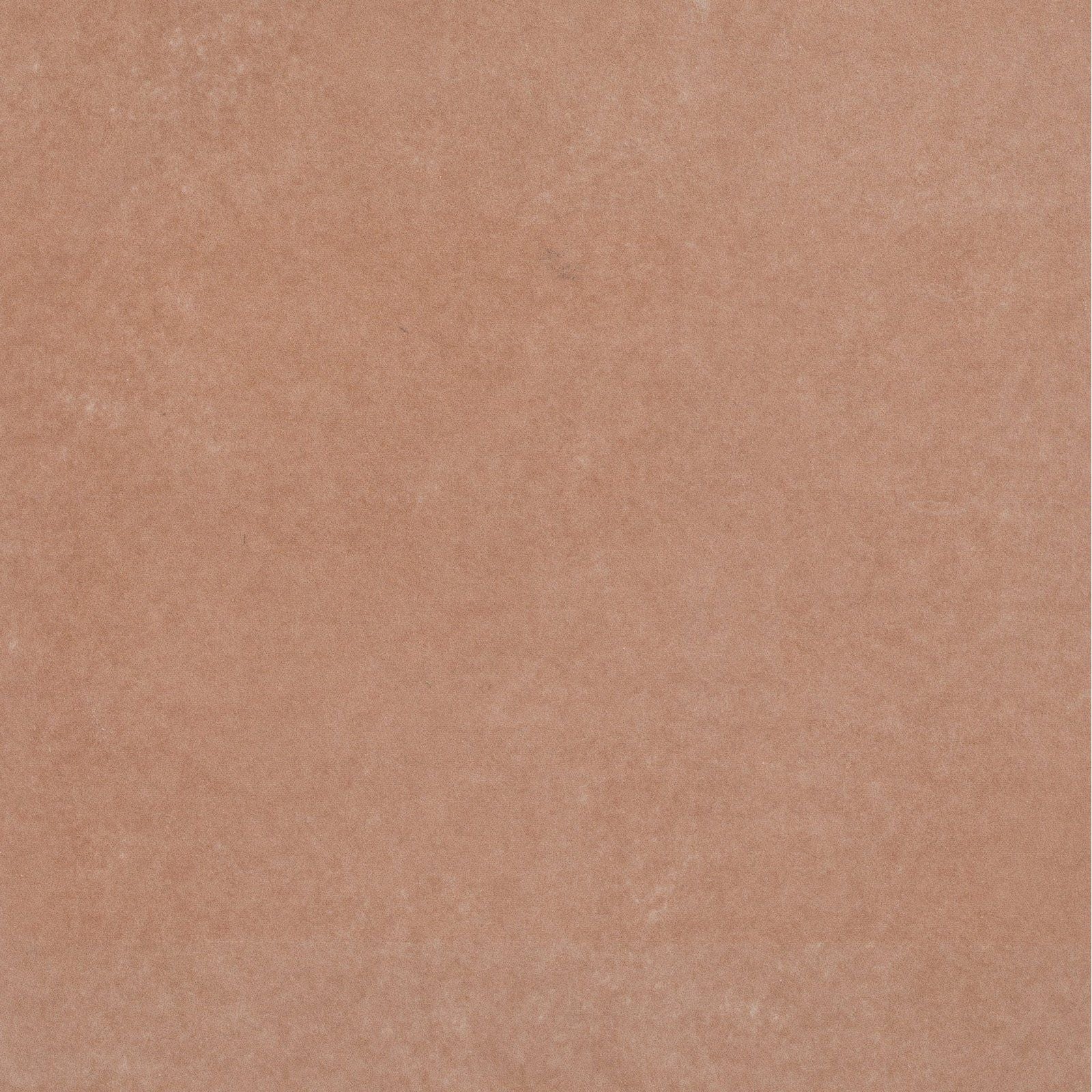 A smooth matte-finished terracotta Adventuras terracotta field porcelain tile with a subtle textured surface