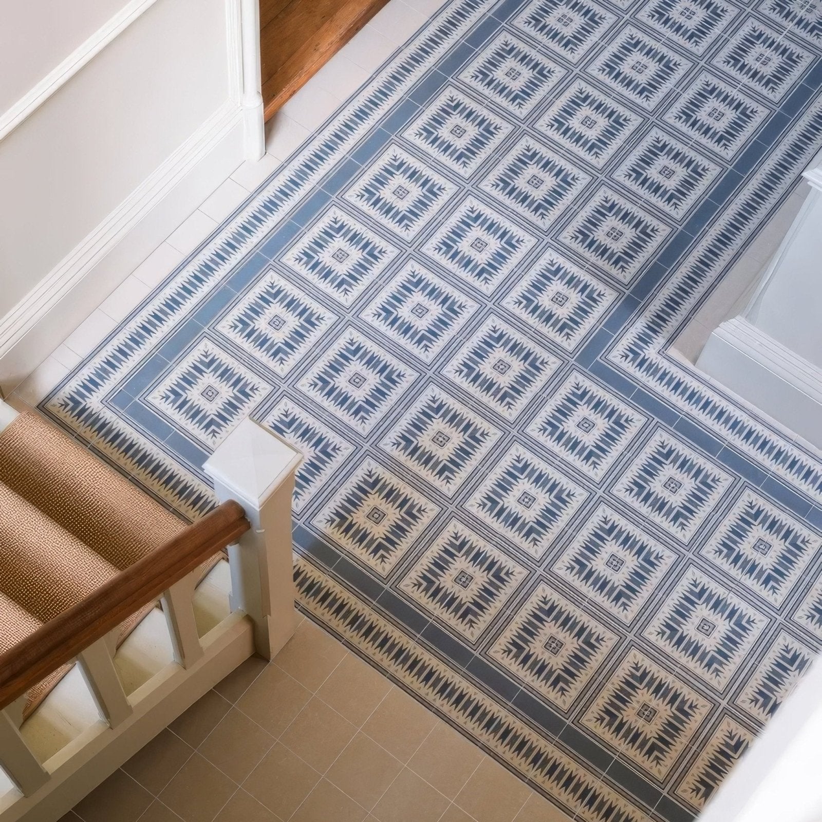 Blue and white geometric patterned vinyl floor tile with vintage inspired design adventuras ziggy border blue porcelain